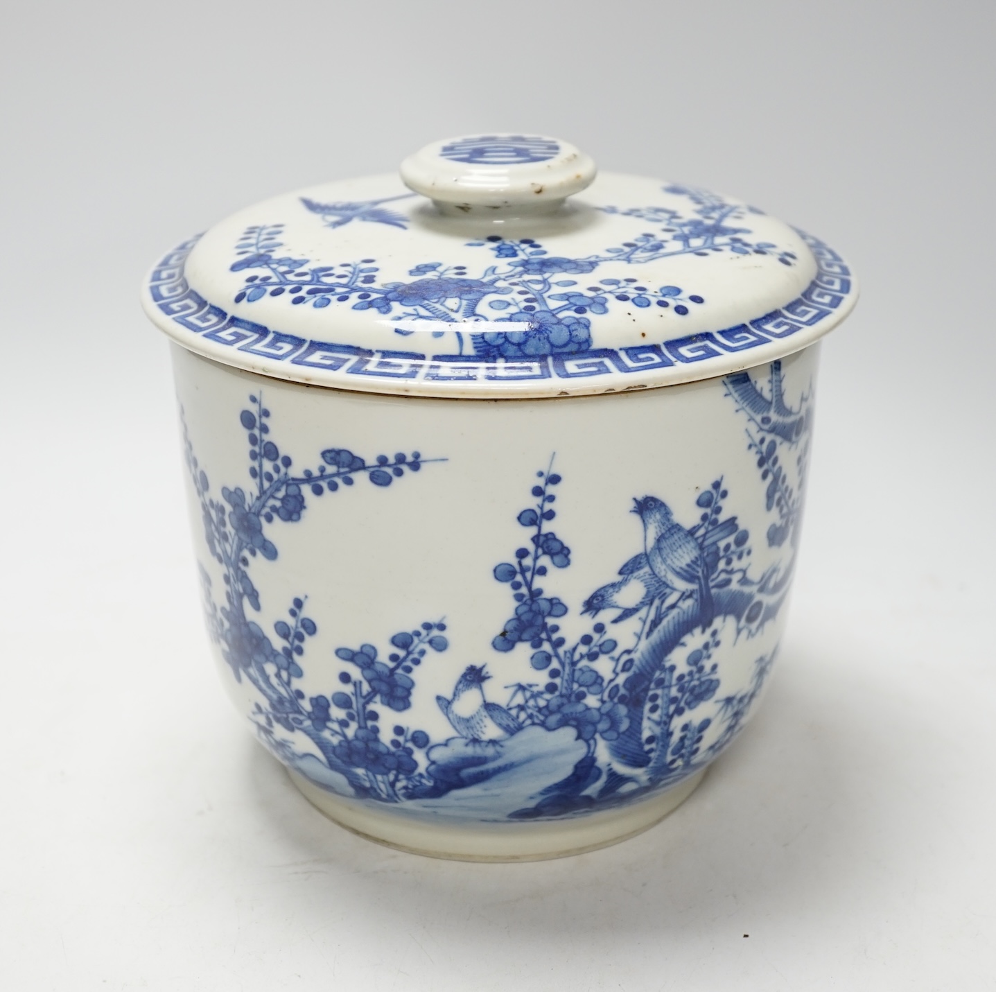 A Chinese porcelain blue and white inscribed jar and cover, 19th century, possibly made for the Vietnamese market, 18cm high